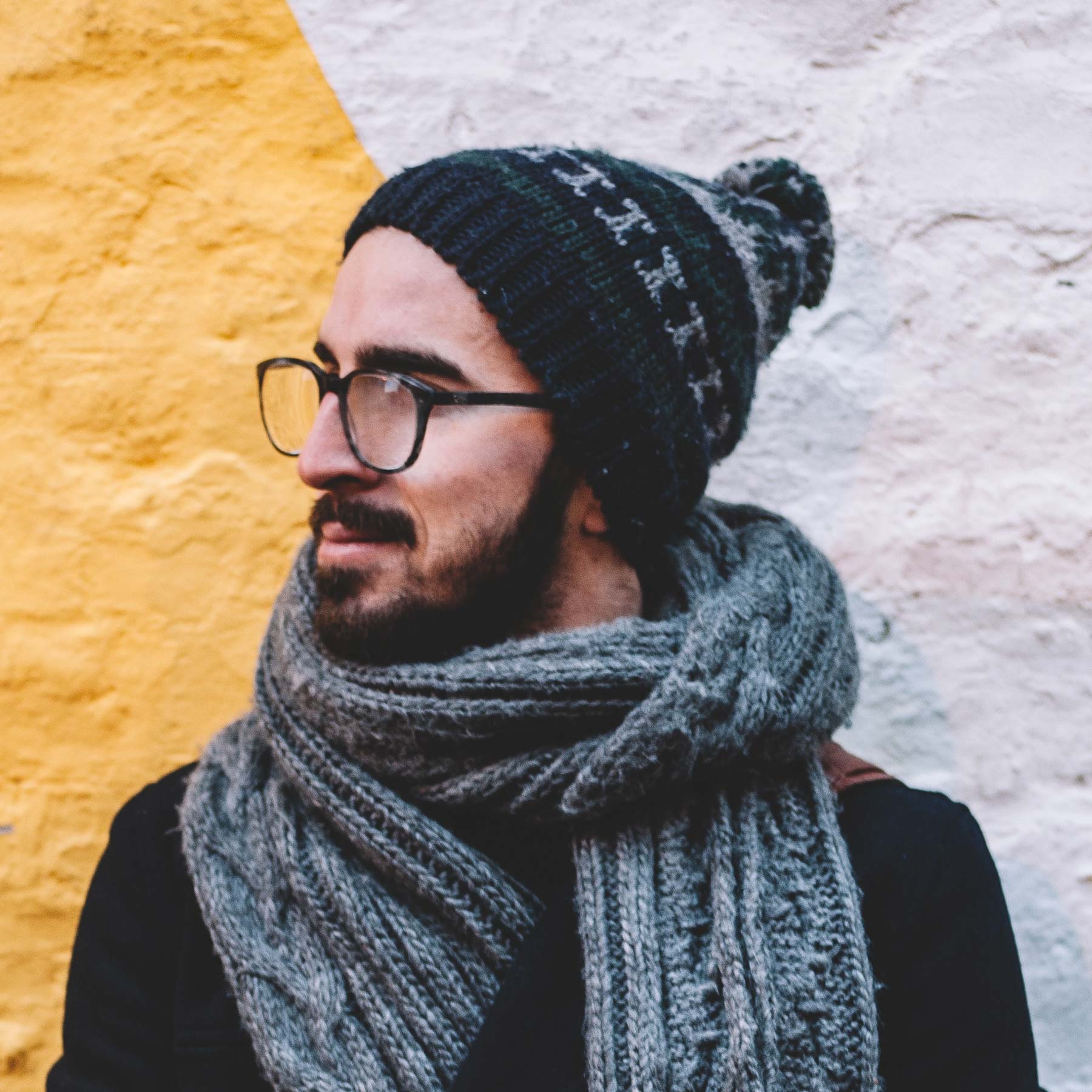 Photo of a man wearing a hat.